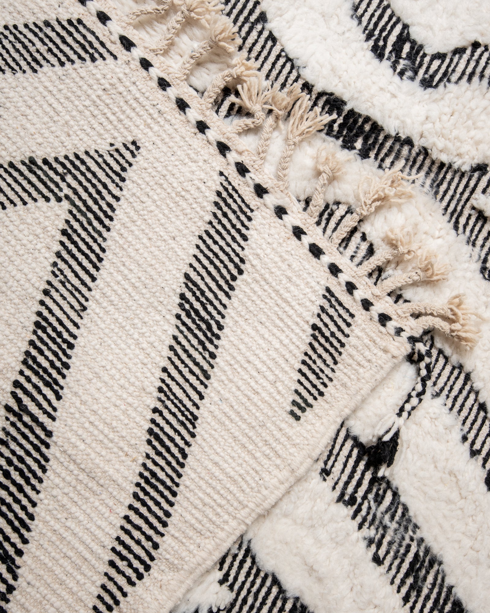 Modern, designer, handcrafted Berber rug from Morocco. Beniourain carpet with beautiful colours and patterns and fluffy wool texture.